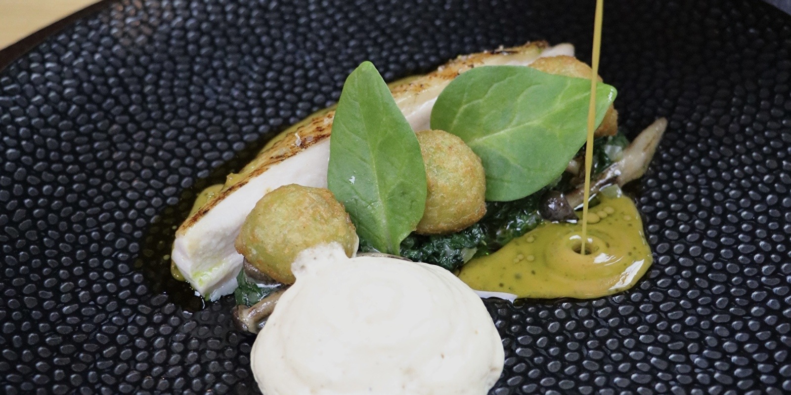 Spinazie en Morilles gerecht Restaurant Wannee
